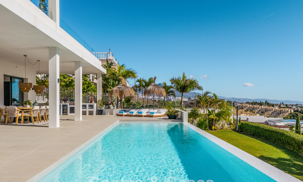 Exclusieve designvilla met panoramisch zeezicht te koop in het een vijfsterren golfresort in Marbella - Benahavis 74766