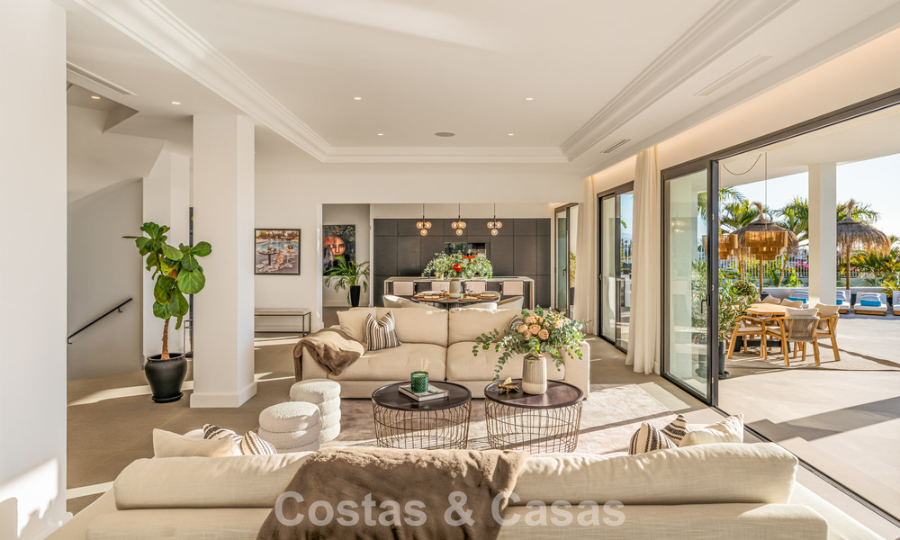 Exclusieve designvilla met panoramisch zeezicht te koop in het een vijfsterren golfresort in Marbella - Benahavis 74775