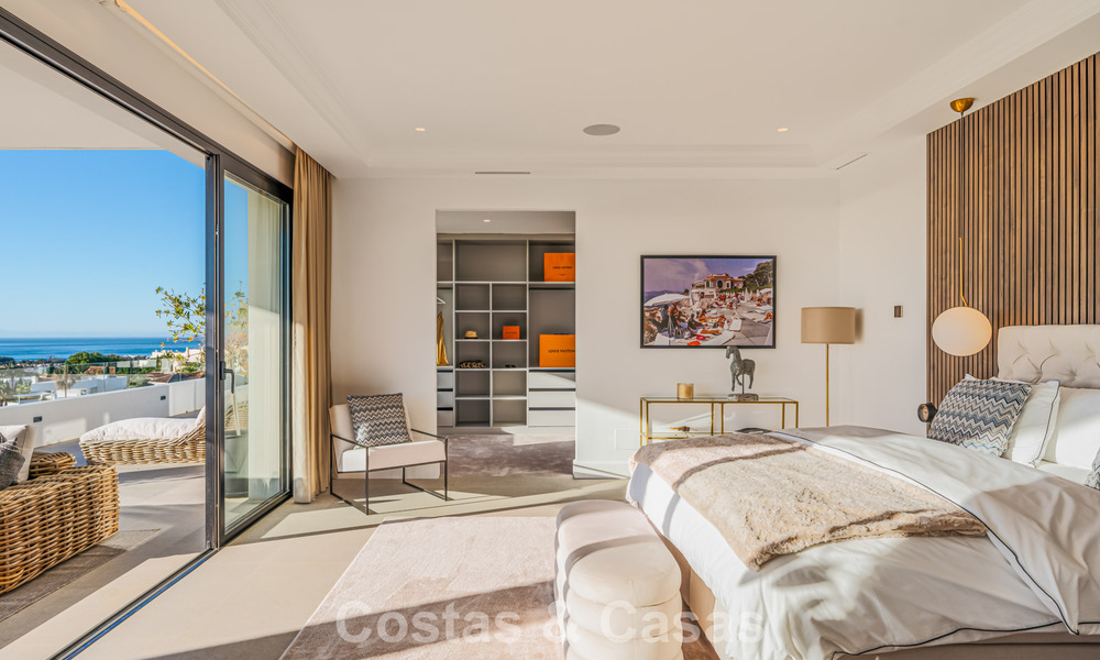 Exclusieve designvilla met panoramisch zeezicht te koop in het een vijfsterren golfresort in Marbella - Benahavis 74781