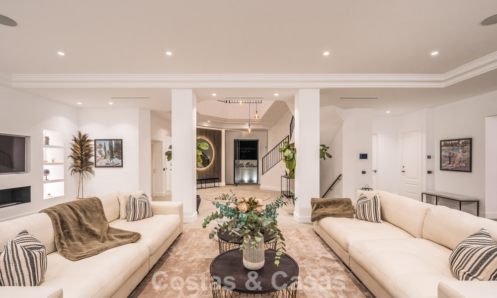 Exclusieve designvilla met panoramisch zeezicht te koop in het een vijfsterren golfresort in Marbella - Benahavis 74809