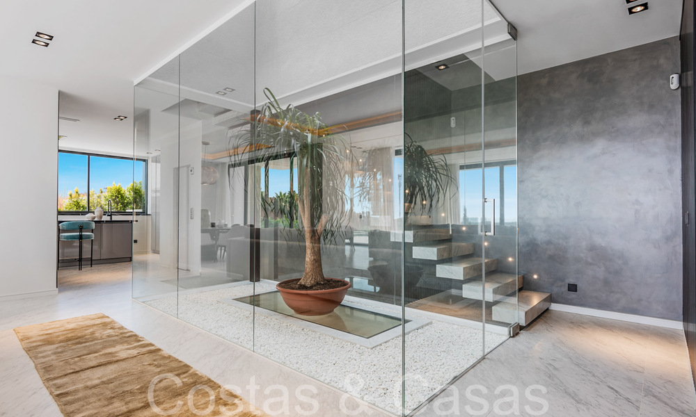 Nieuwe, modernistische designervilla te koop met prachtig zeezicht in vijfsterren golfresort te Marbella - Benahavis 68477