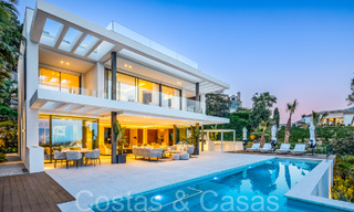 Instapklare, moderne luxevilla met onbelemmerd zeezicht te koop, gelegen in La Quinta, Marbella - Benahavis 67778 