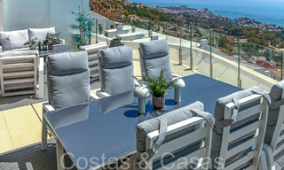 Luxueus, modern, duplex penthouse met panoramisch zeezicht te koop in Benalmadena, Costa del Sol 68033 