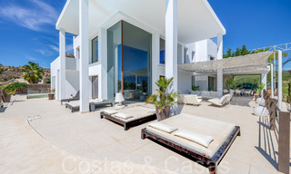 Instapklare, high-end designervilla te koop, frontlinie golf met zeezicht in Benahavis - Marbella 68417 