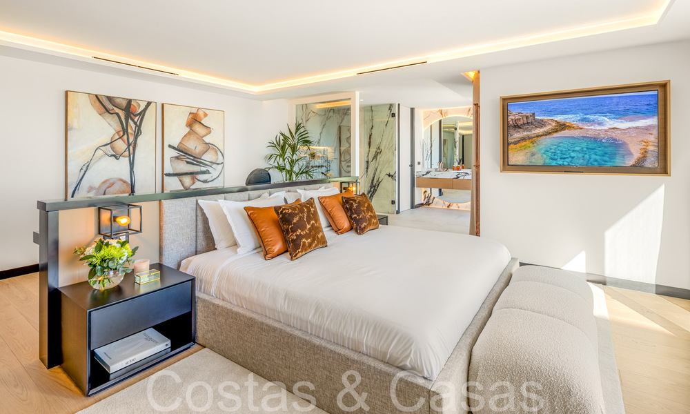 Eersteklas duplex penthouse met panoramisch zeezicht en eigen dompelbad te koop in Nueva Andalucia, Marbella 69445