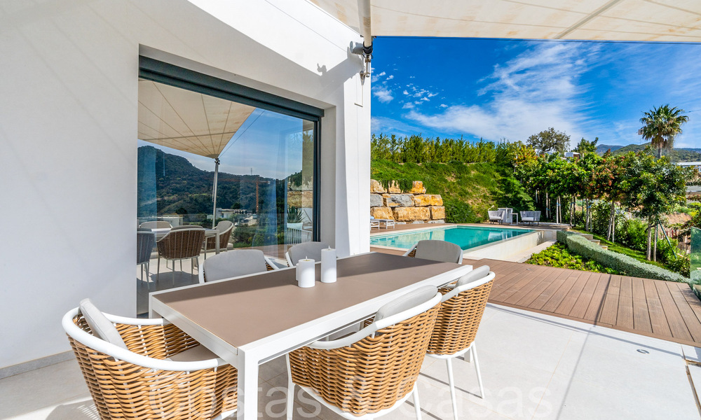 Instapklare luxevilla met panoramische vergezichten te koop in een gated community van Benahavis - Marbella 70060