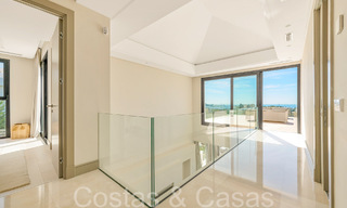 Moderne luxevilla met fantastisch uitzicht over de golfbaan naar zee, te koop in Marbella - Benahavis 70487 