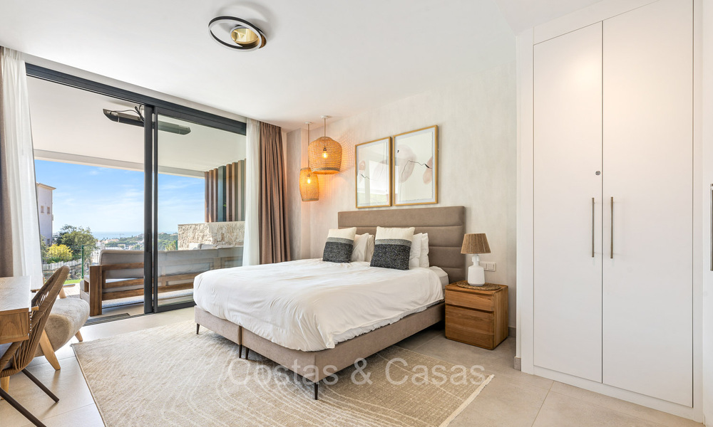 Instapklaar, modern, elegant tuinappartement met privétuin en zeezicht te koop in Oost Marbella 72721