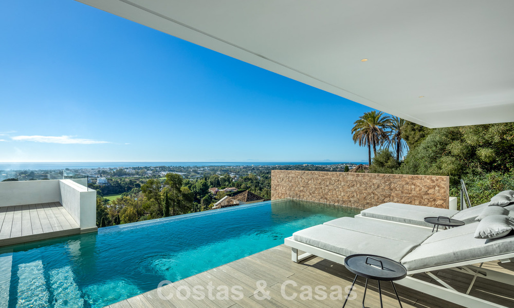 Instapklare, moderne luxevilla te koop, met zeezicht in een gated community in Benahavis - Marbella 773597