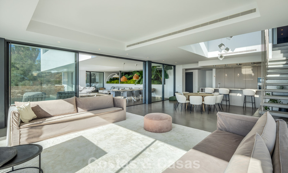 Instapklare, moderne luxevilla te koop, met zeezicht in een gated community in Benahavis - Marbella 773599