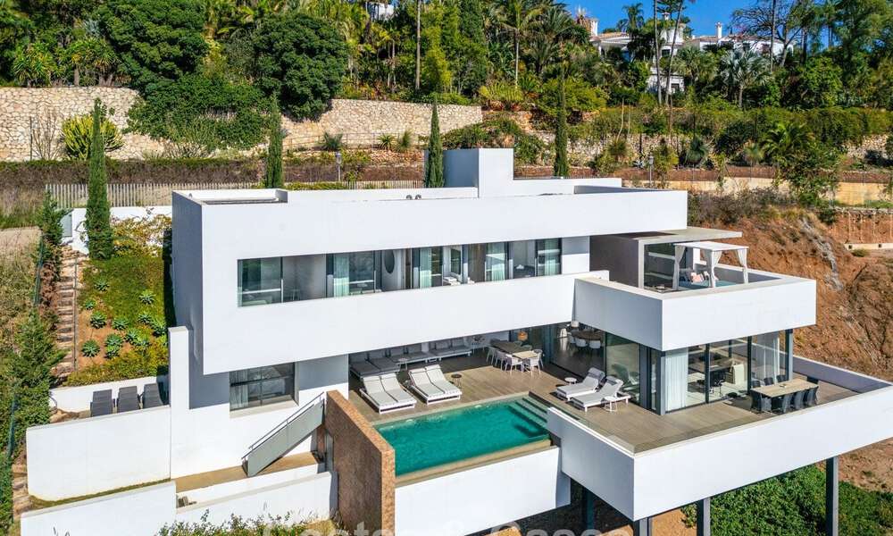 Instapklare, moderne luxevilla te koop, met zeezicht in een gated community in Benahavis - Marbella 773608